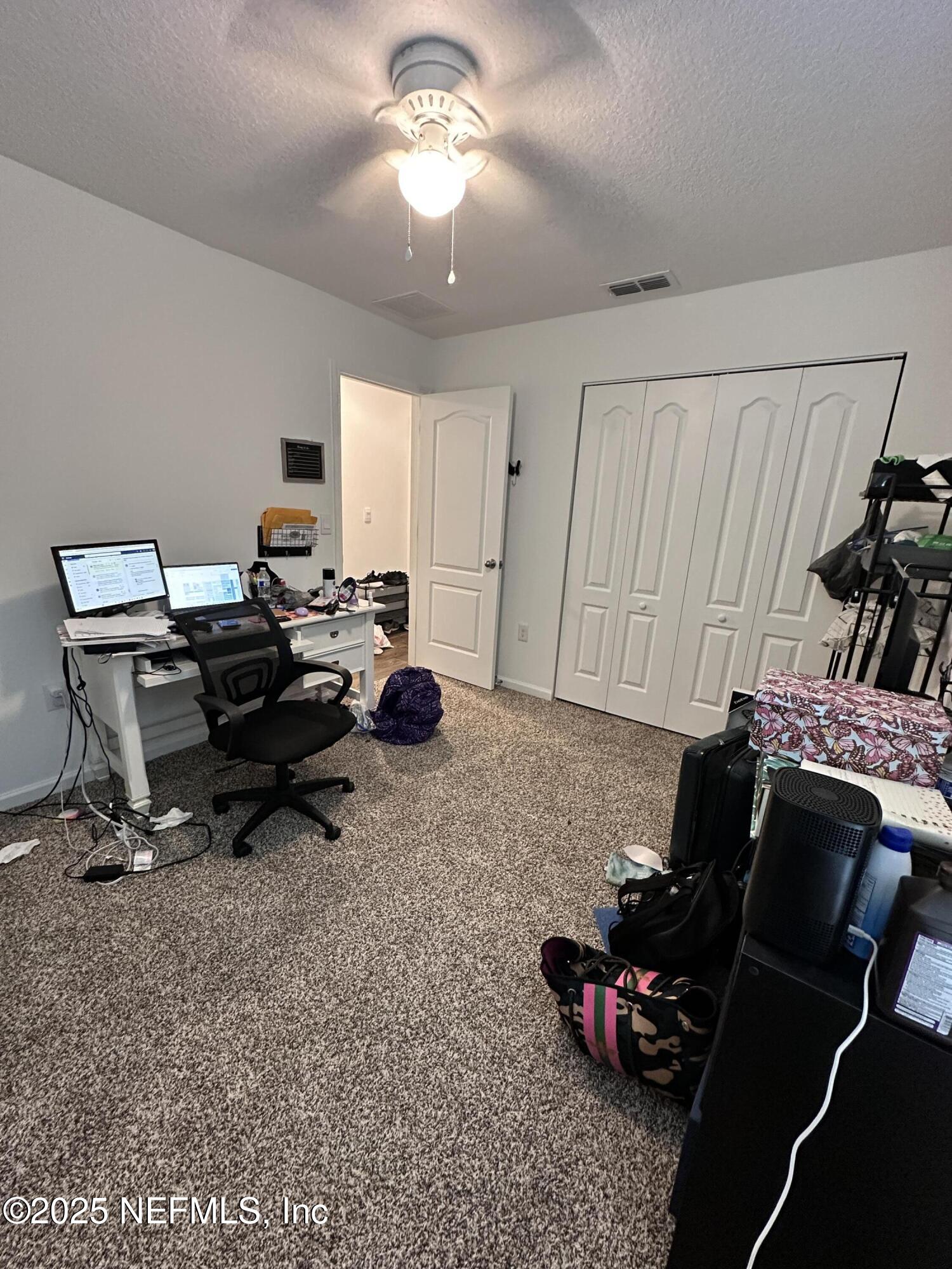 2769 Oak Strm Drive Green Cove Springs, FL 32043 - Photo 10 of 17 a work room with furniture and a window