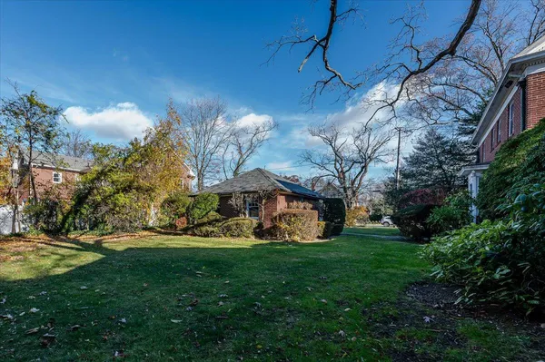 a view of a house with a big yard