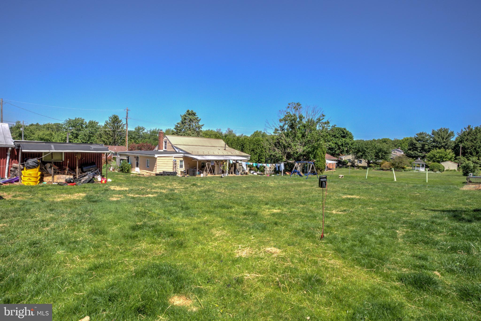 3472 Messersmith Road York, PA 17408 - Photo 10 of 41 Spacious green oasis under clear skies.