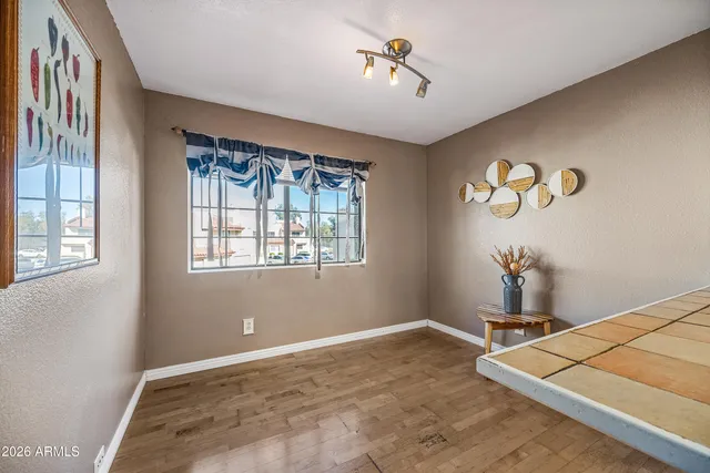 a view of a swimming pool and a chandelier