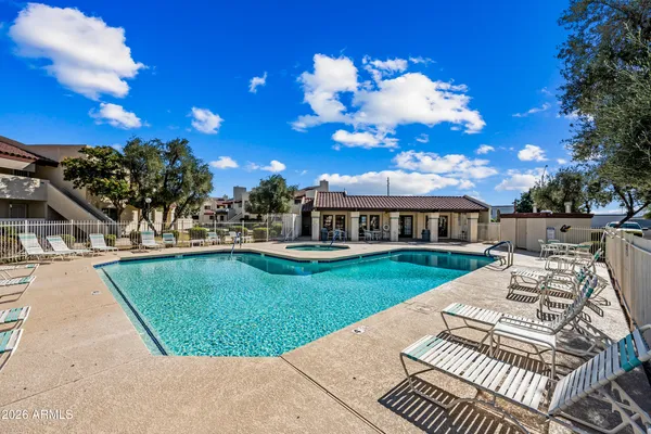 a view of a house with a swimming pool