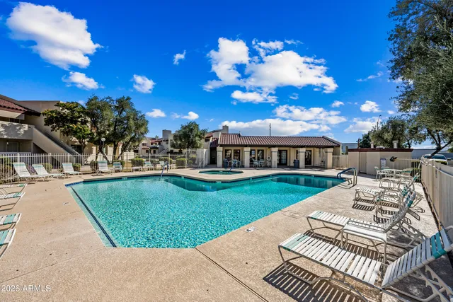 a view of a house with a swimming pool