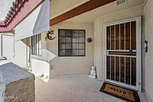 a view of a house with a large window