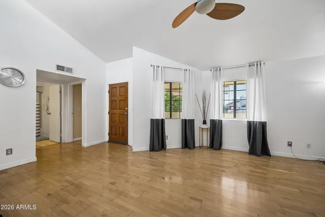 a view of a swimming pool with a patio