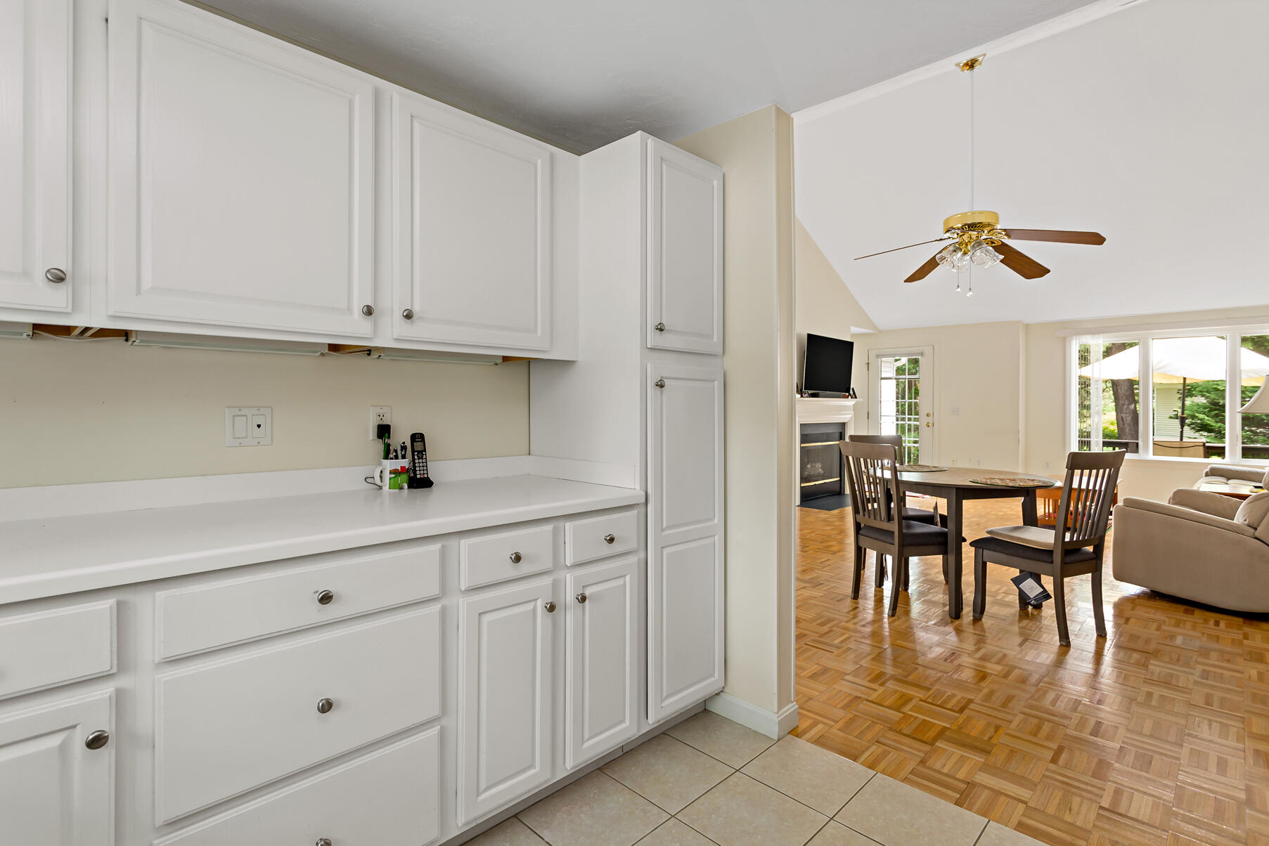 5 Friendship Court Mashpee, MA 02649 - Photo 11 of 32 a view of kitchen with furniture and wooden floor