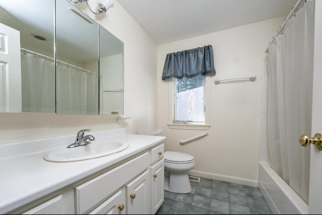 5 Friendship Court Mashpee, MA 02649 - Photo 13 of 32 a bathroom with a sink toilet and shower