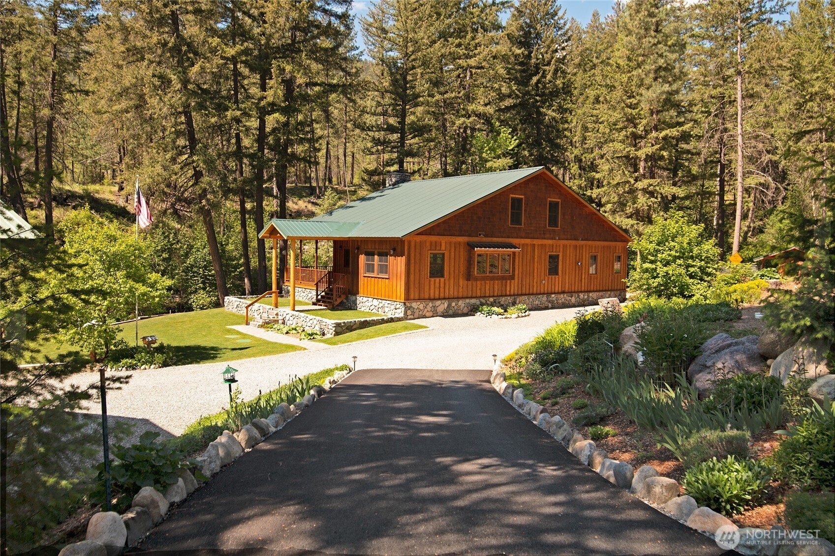 201 Libby Creek Road Carlton, WA 98814 - Photo 23 of 37 a front view of a house with a yard