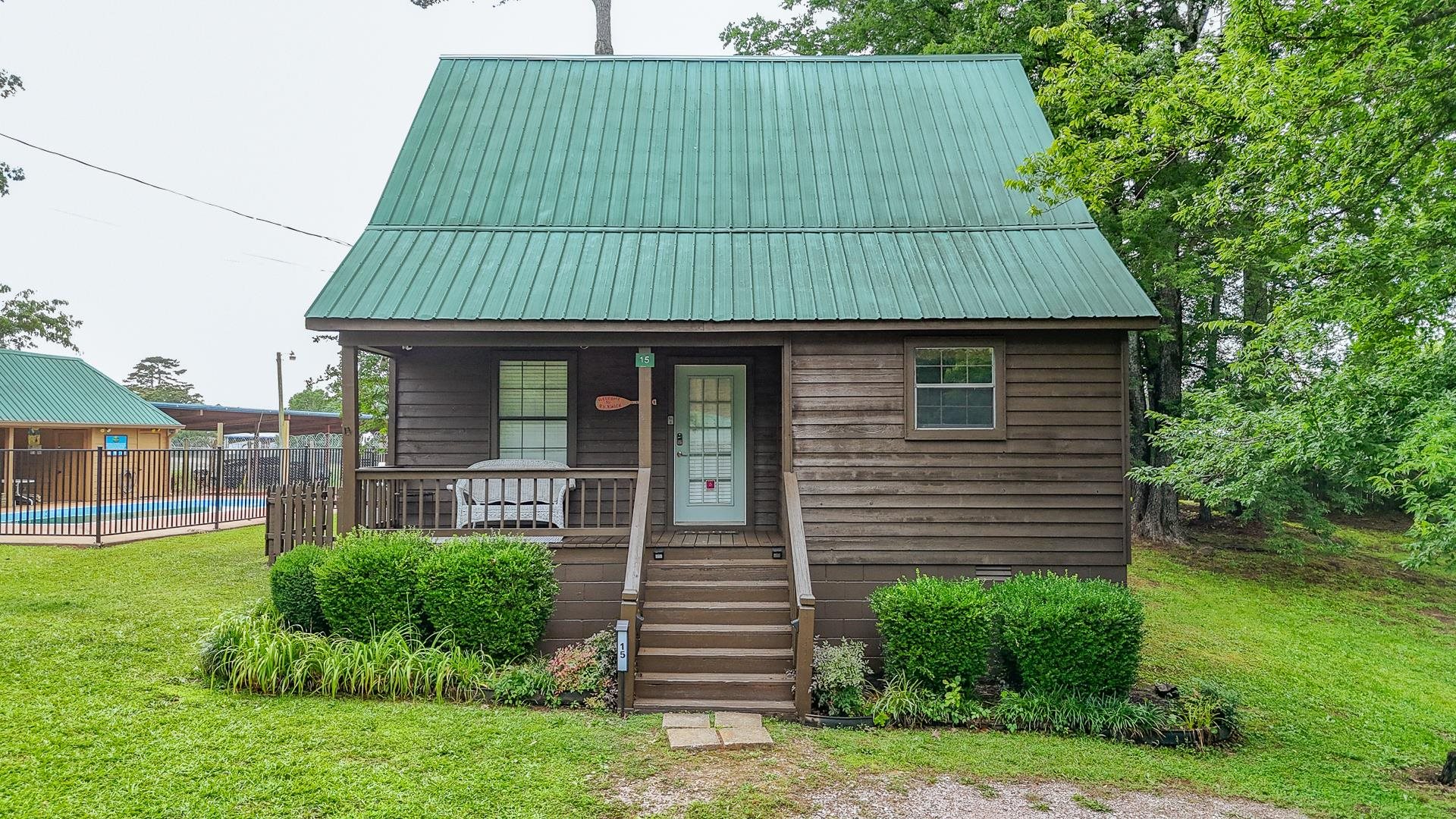 a aerial view of a house with a yard