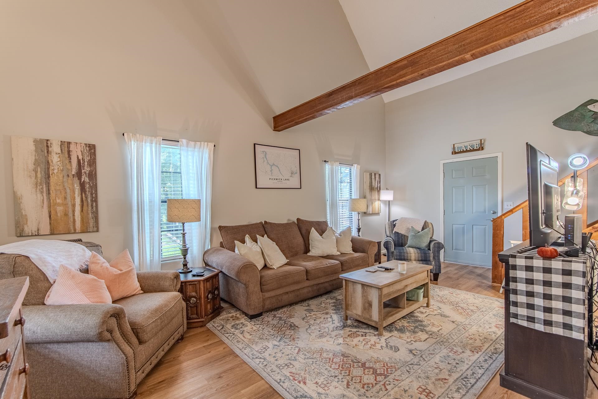 15 Lilly Cove Counce, TN 38326 - Photo 12 of 39 a living room with furniture a rug and a large window