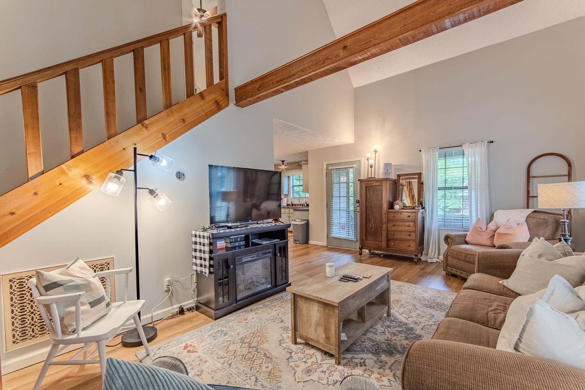 15 Lilly Cove Counce, TN 38326 - Photo 14 of 39 a living room with furniture a rug and a flat screen tv