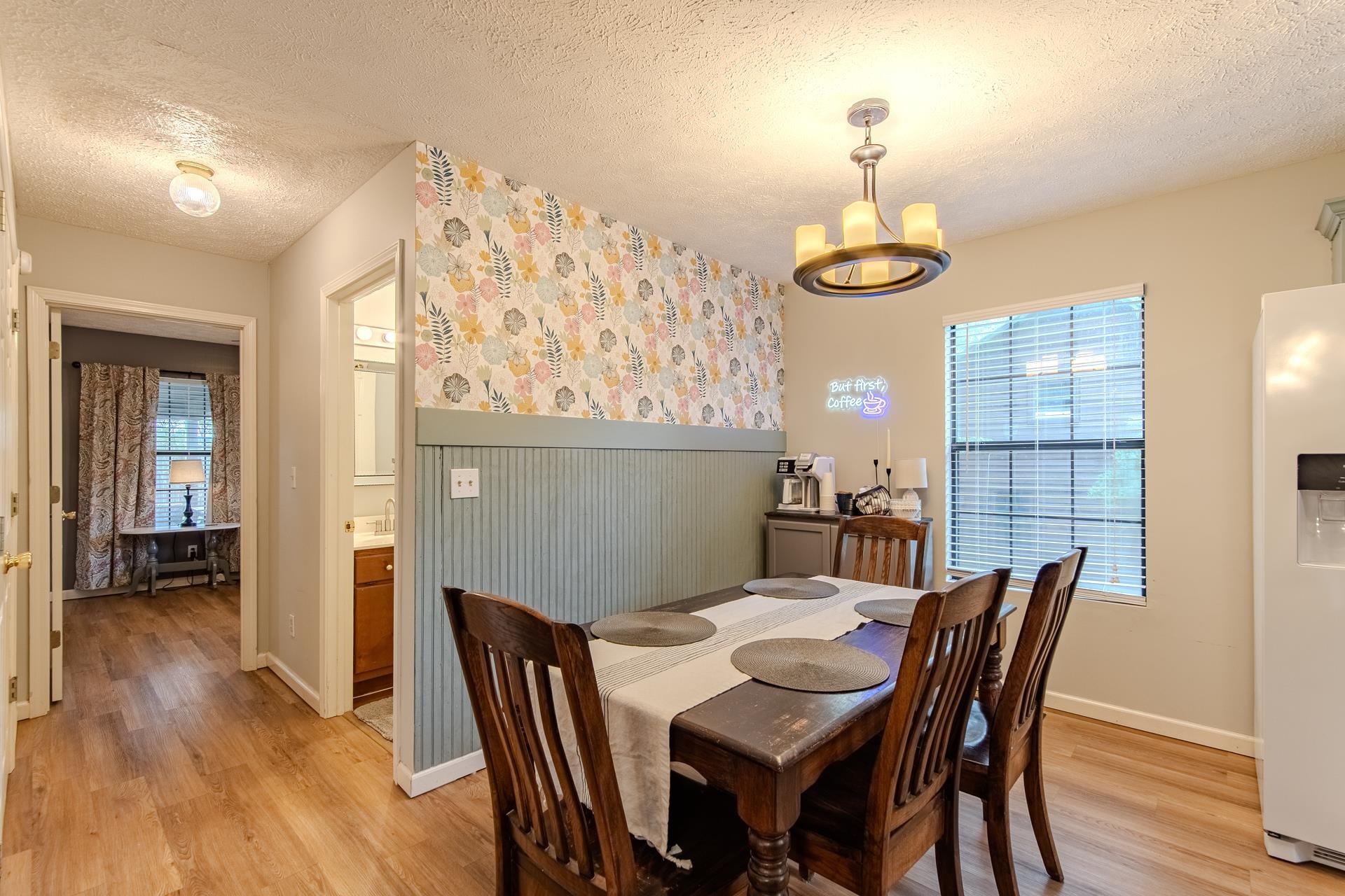 15 Lilly Cove Counce, TN 38326 - Photo 3 of 39 a dining room with furniture wooden floor and a chandelier
