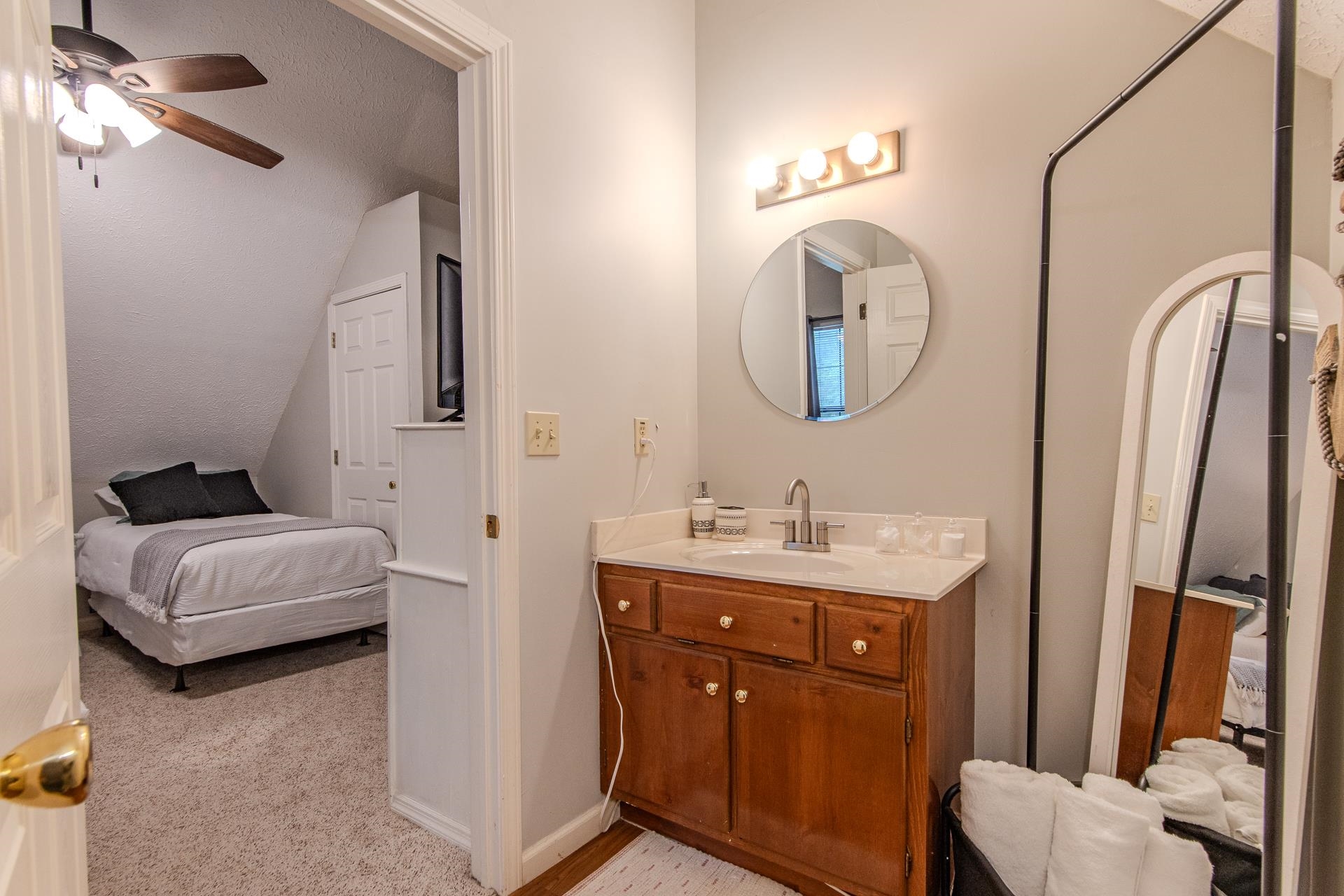 15 Lilly Cove Counce, TN 38326 - Photo 31 of 39 a en suite bathroom with a double vanity sink and a mirror