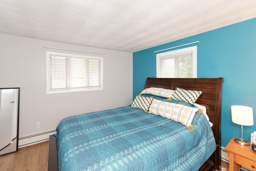 54 Gregory Road Framingham, MA 01701 - Photo 25 of 41 a bedroom with a bed and a window