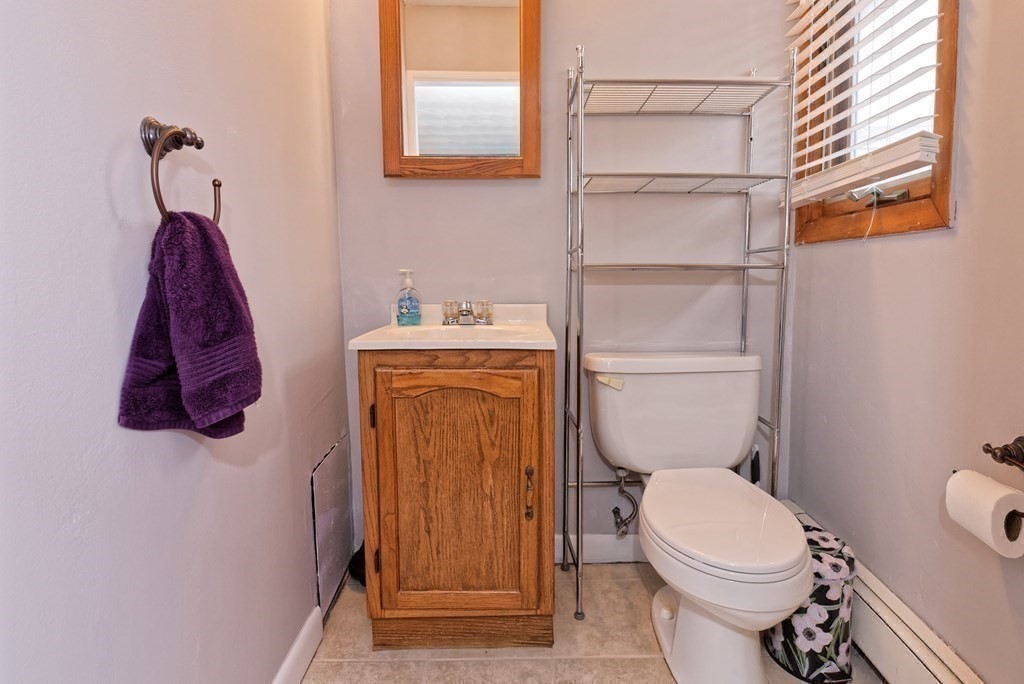 54 Gregory Road Framingham, MA 01701 - Photo 28 of 41 a bathroom with a toilet and a sink