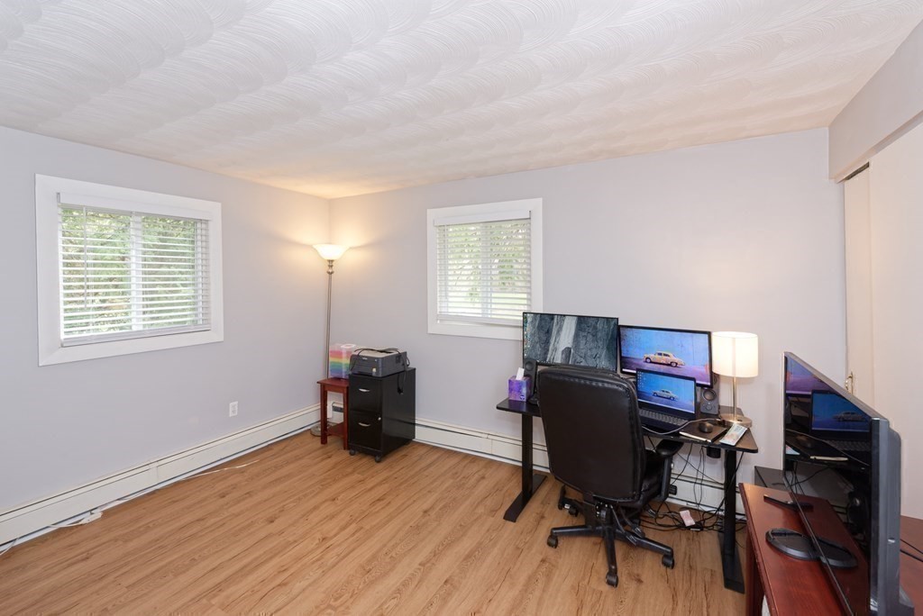 54 Gregory Road Framingham, MA 01701 - Photo 35 of 41 a view of a workspace with furniture and a window