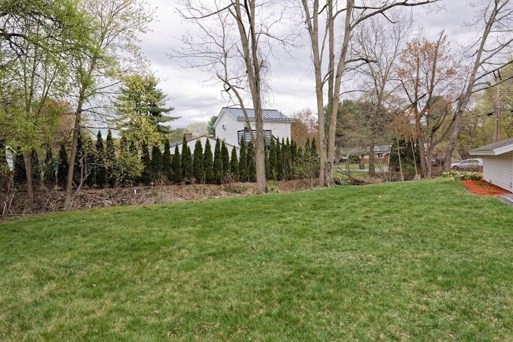 54 Gregory Road Framingham, MA 01701 - Photo 37 of 41 a view of a park with large trees