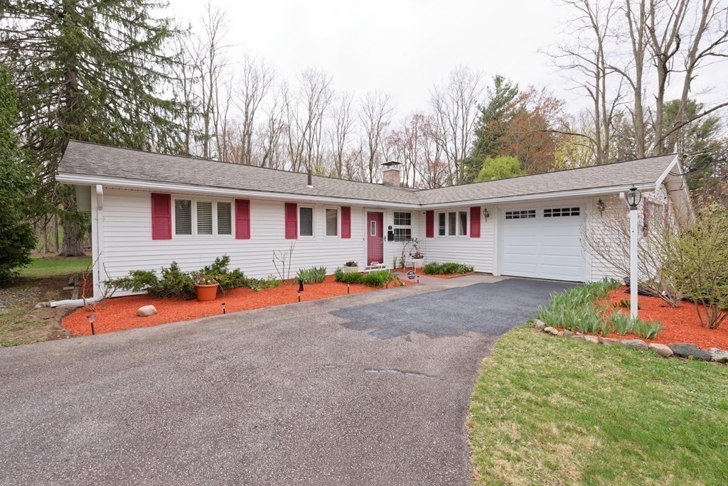 54 Gregory Road Framingham, MA 01701 - Photo 4 of 41 front view of house with a yard and potted plants