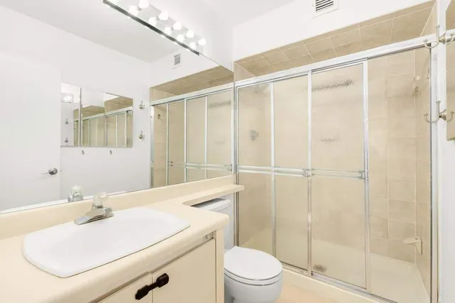 a bathroom with a sink a toilet and a bathtub