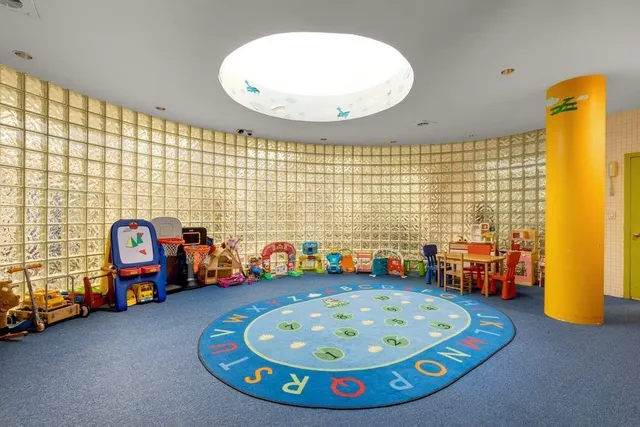 a view of a swimming pool with a lounge chairs