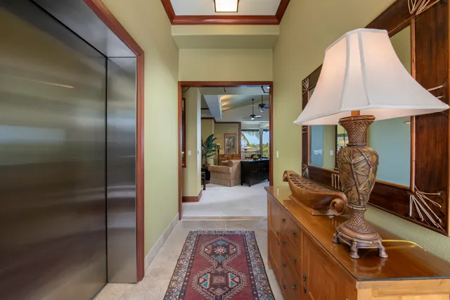 a room with wooden floor and furniture