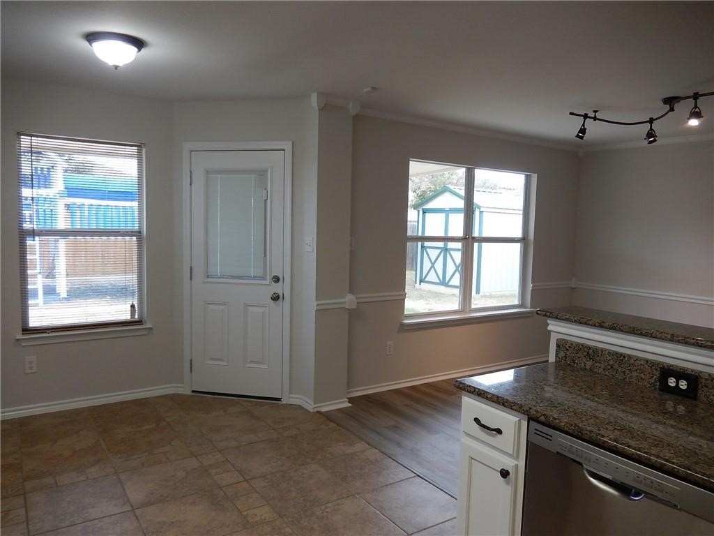 116 Rinehardt Street Hutto, TX 78634 - Photo 17 of 27 an empty room with windows