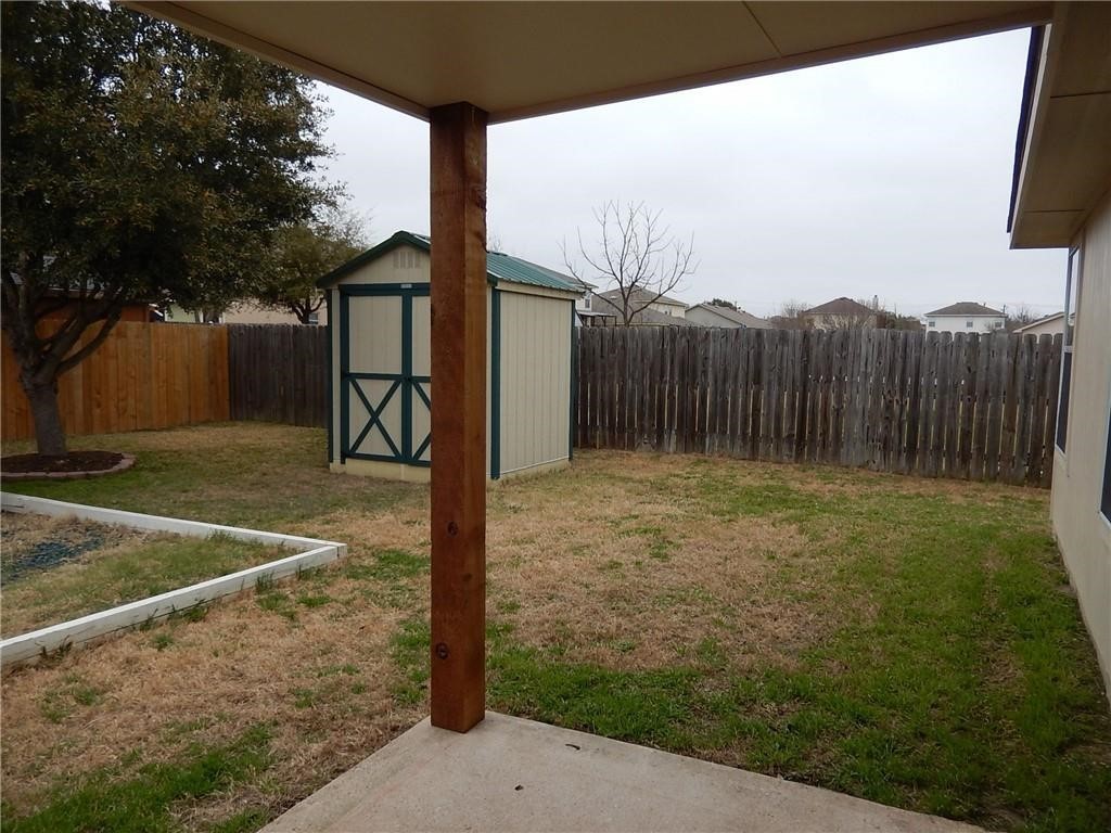 116 Rinehardt Street Hutto, TX 78634 - Photo 26 of 27 a view of a backyard