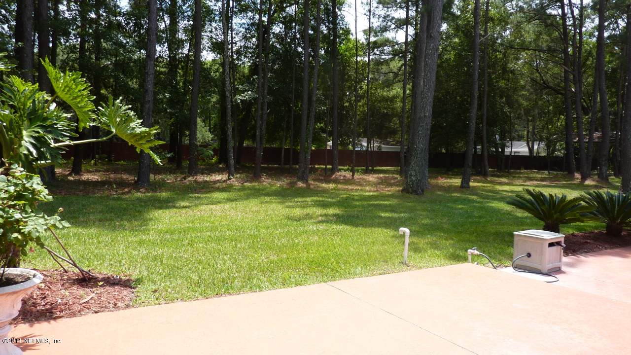 2545 County Dock Road Jacksonville, FL 32223 - Photo 54 of 62 a swimming pool with lots of green space