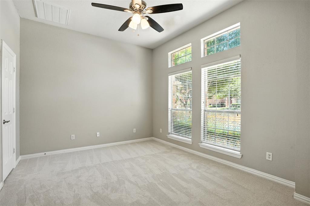8220 Holliday Road Lantana, TX 76226 - Photo 11 of 40 Room featuring a vaulted ceiling with a ceiling fan