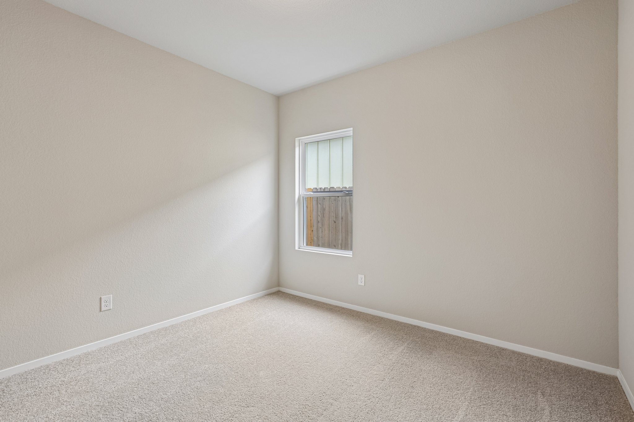 5513 Sacra Cove Austin, TX 78747 - Photo 27 of 37 an empty room with a window