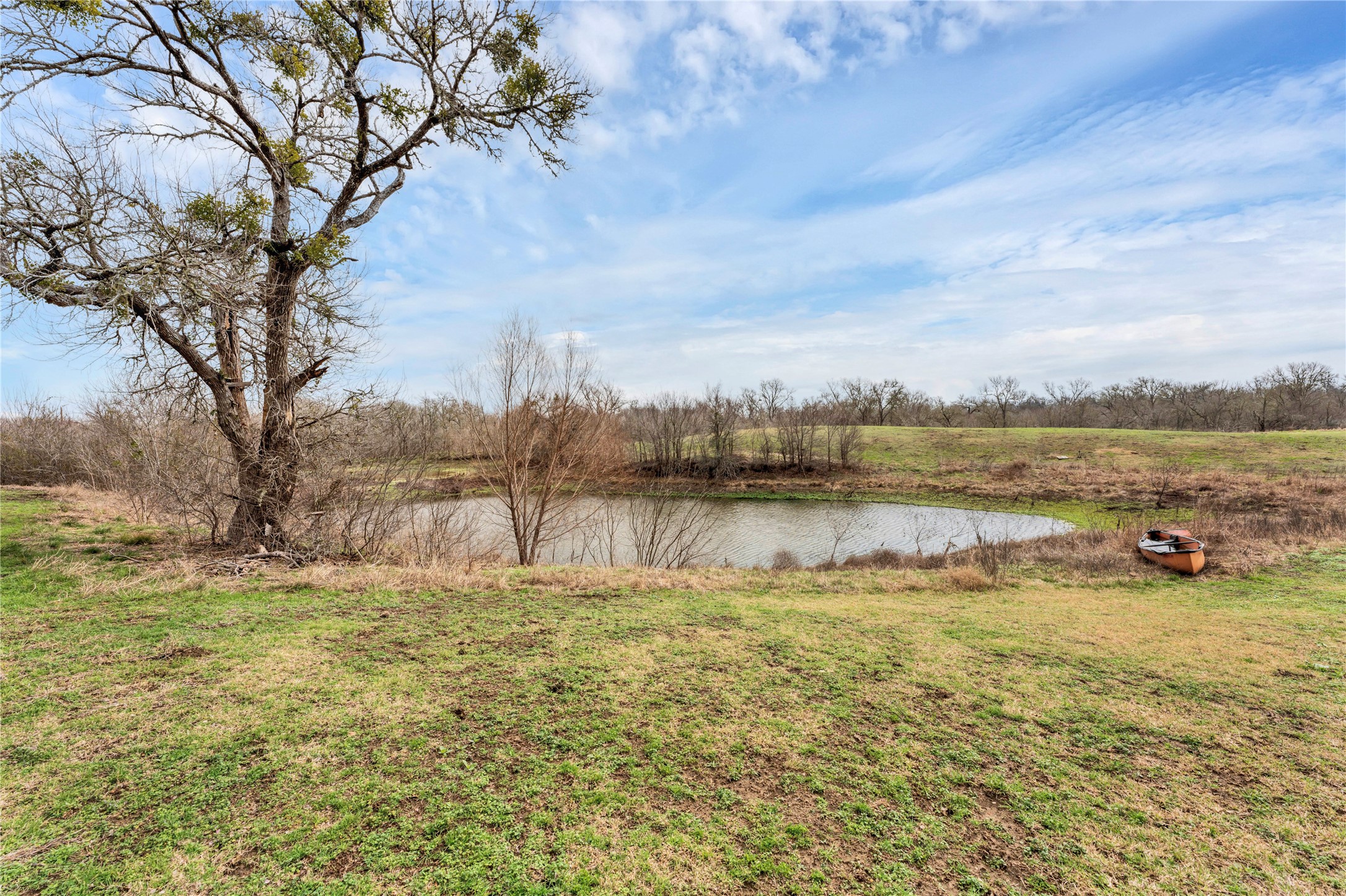 471 County Road 471 Road Thrall, TX 76578 - Photo 4 of 20 a view of a lake with houses in the back