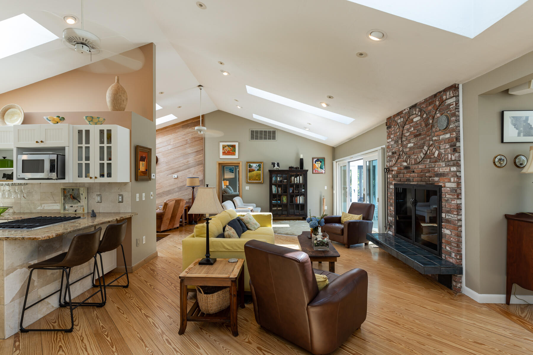 25 Adams Way Eastham, MA 02642 - Photo 13 of 60 a living room with fireplace furniture and a wooden floor