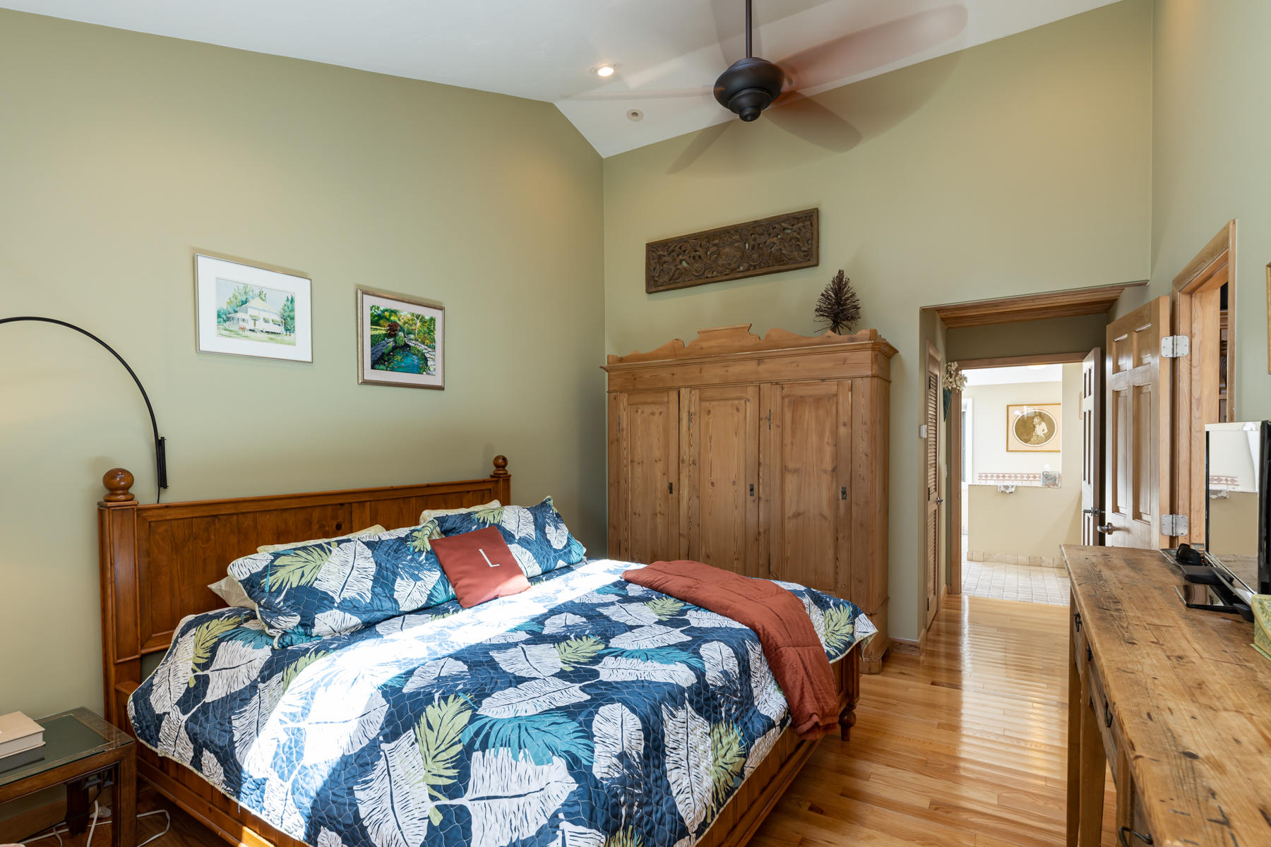 25 Adams Way Eastham, MA 02642 - Photo 20 of 60 a bedroom with a bed and a flat screen tv