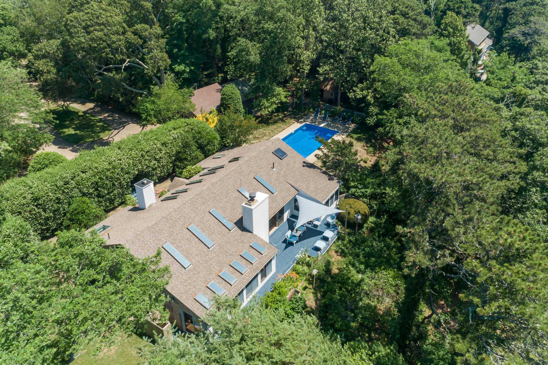 25 Adams Way Eastham, MA 02642 - Photo 2 of 60 an aerial view of a house with a yard and outdoor seating
