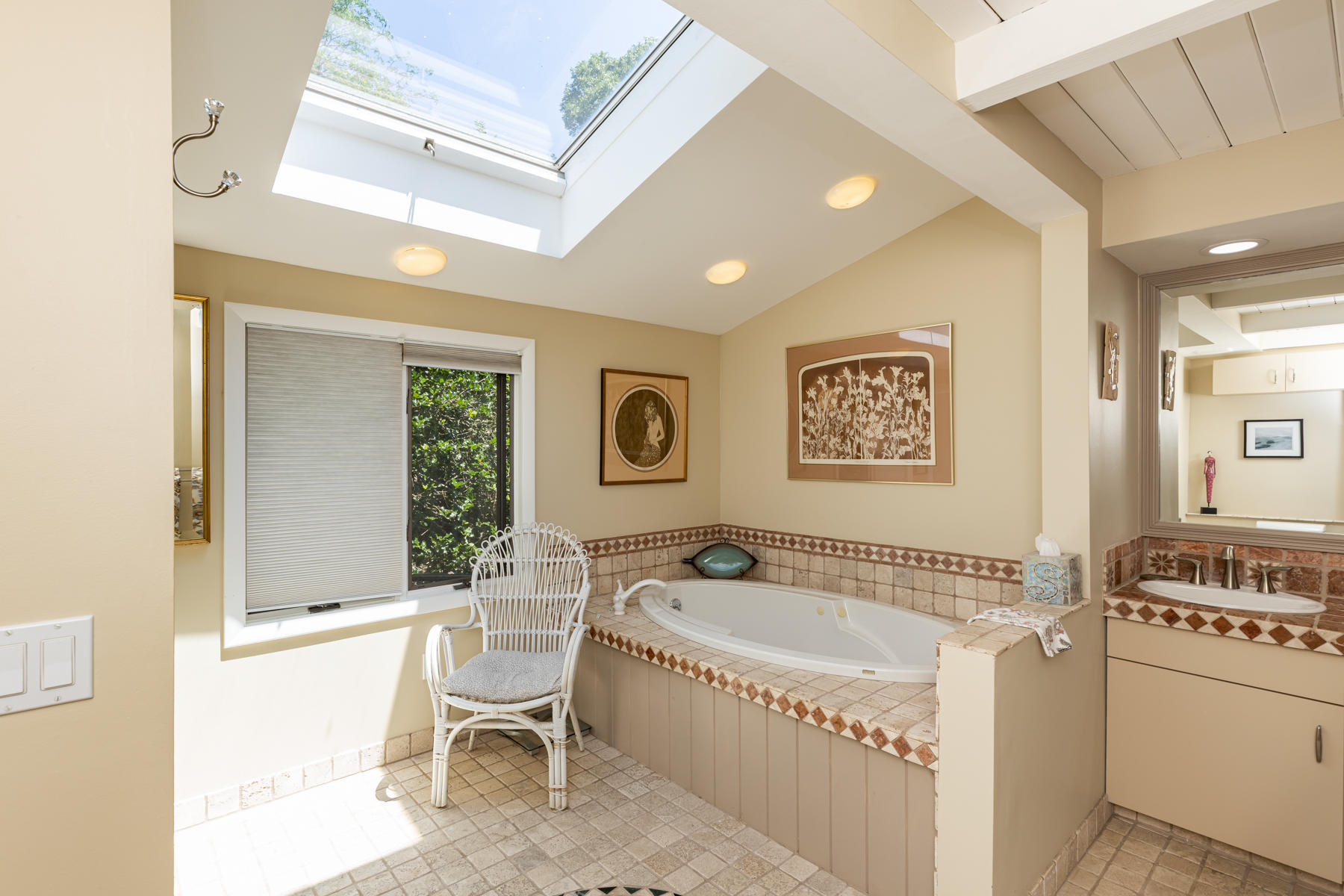 25 Adams Way Eastham, MA 02642 - Photo 24 of 60 a bathroom with a tub a sink and a window