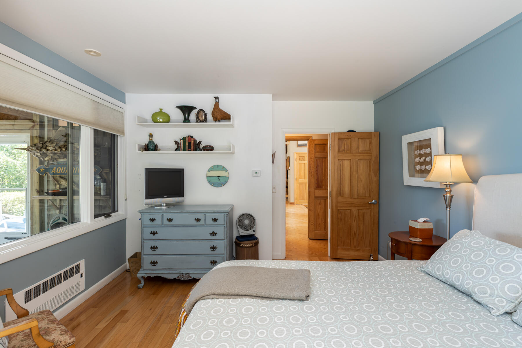 25 Adams Way Eastham, MA 02642 - Photo 27 of 60 a bedroom with a bed and furniture