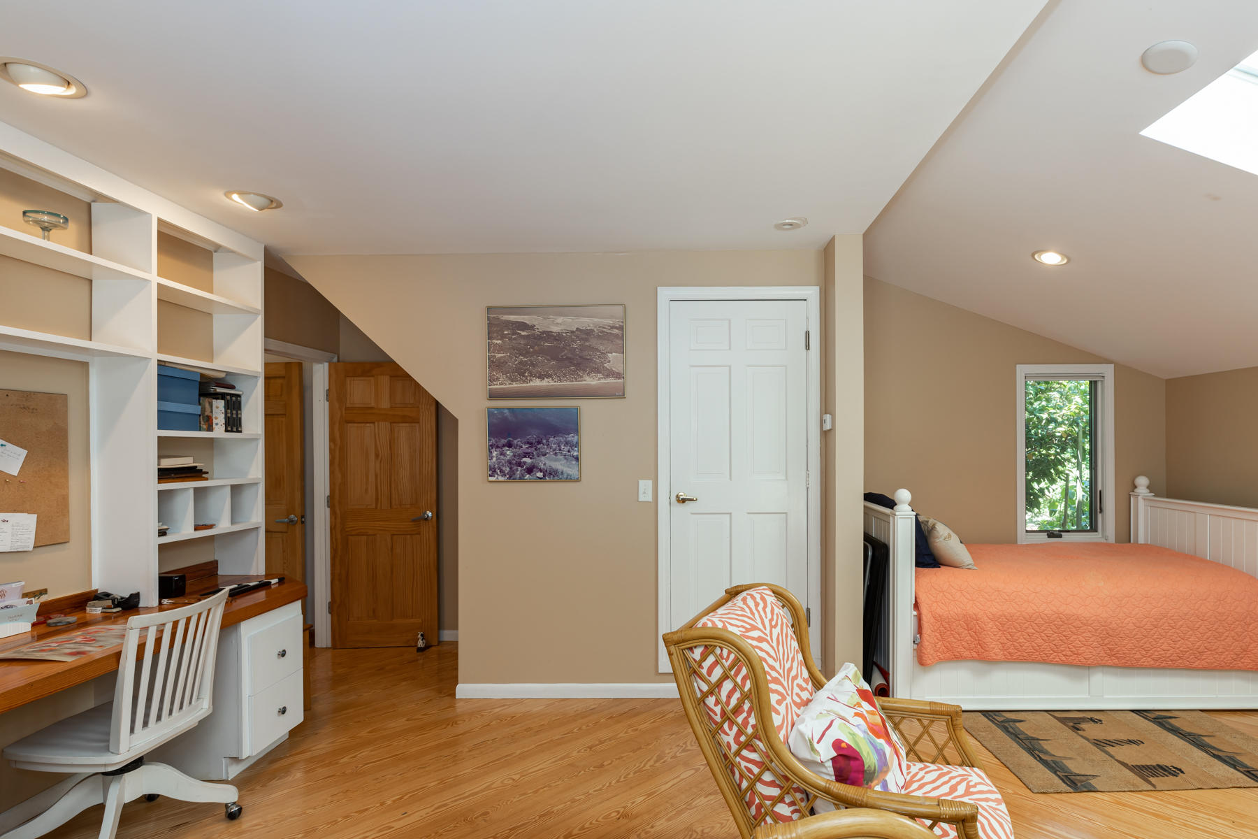 25 Adams Way Eastham, MA 02642 - Photo 32 of 60 a bedroom with furniture and a chair