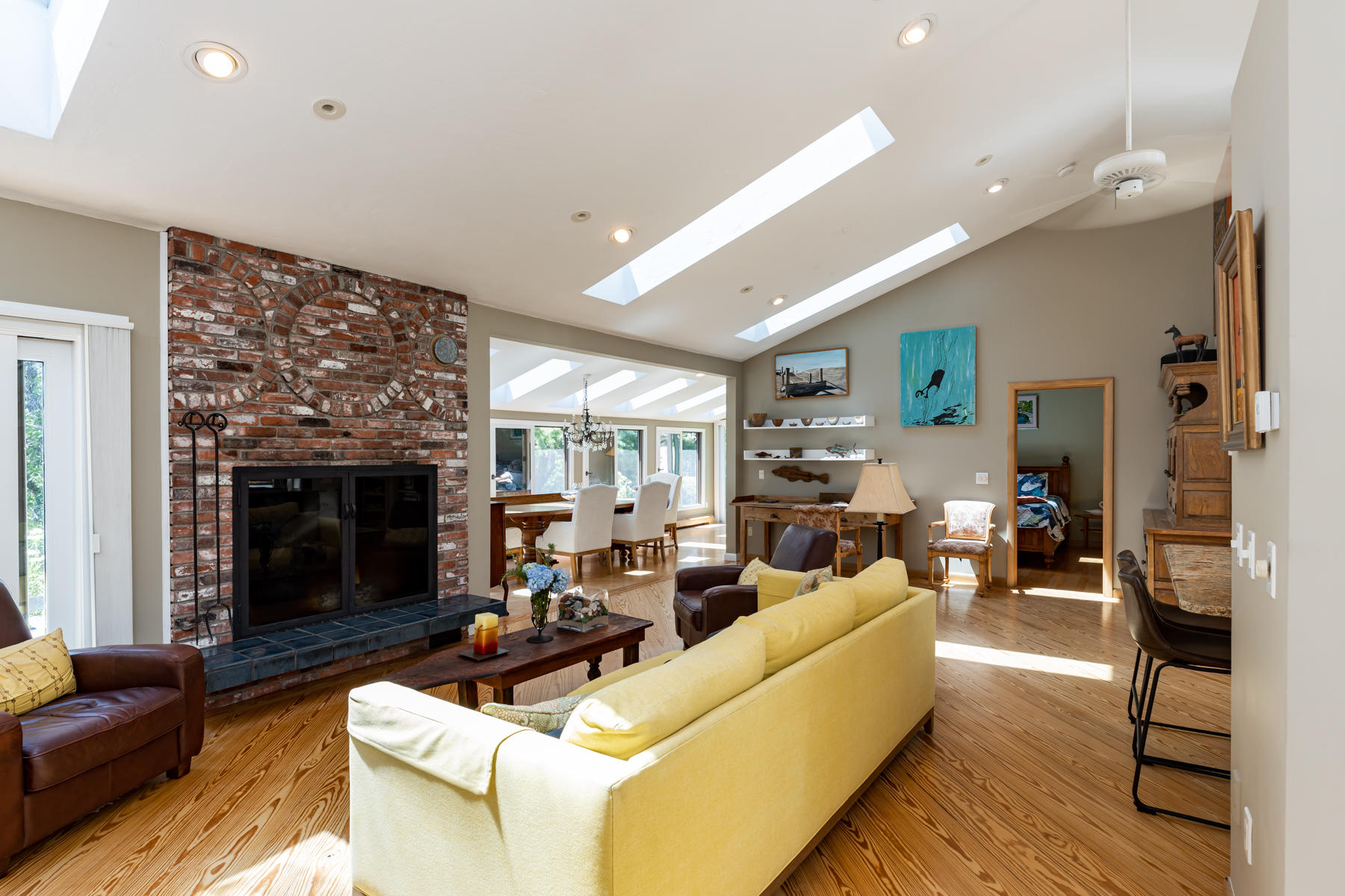 25 Adams Way Eastham, MA 02642 - Photo 37 of 60 a living room with furniture and a fireplace
