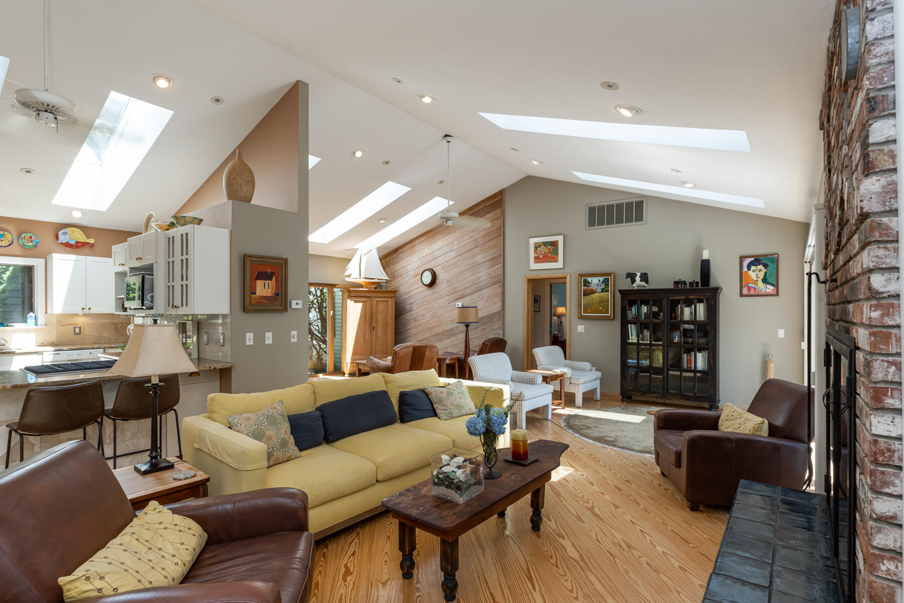 25 Adams Way Eastham, MA 02642 - Photo 38 of 60 a living room with furniture and a wooden floor