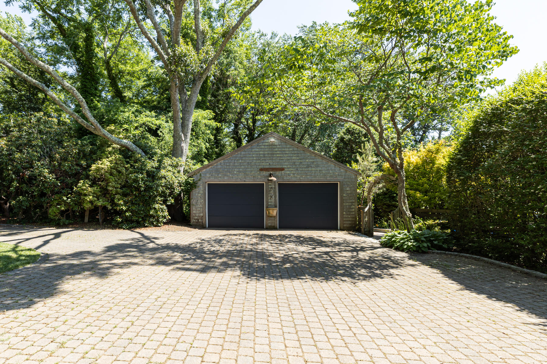 25 Adams Way Eastham, MA 02642 - Photo 45 of 60 a front view of a house with a yard