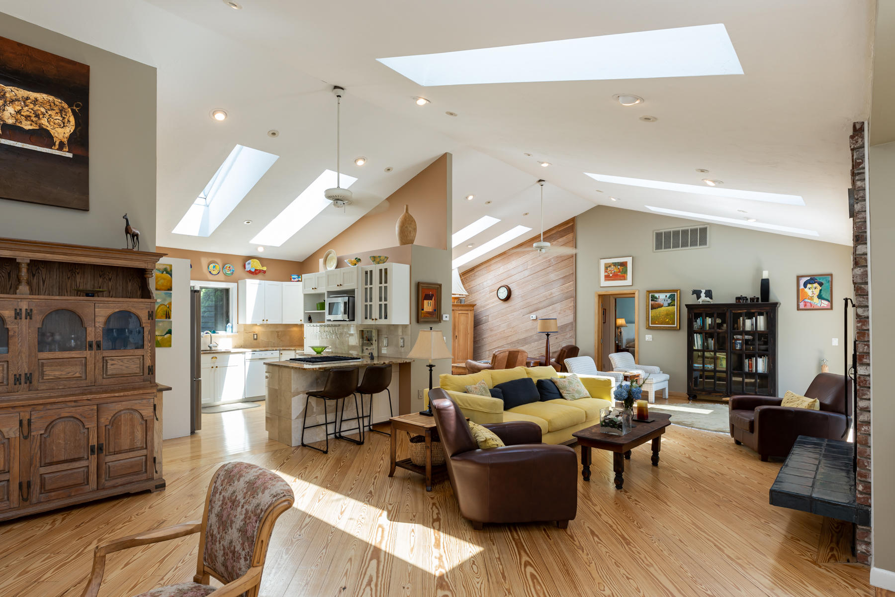 25 Adams Way Eastham, MA 02642 - Photo 46 of 60 a living room with furniture kitchen view and a large window