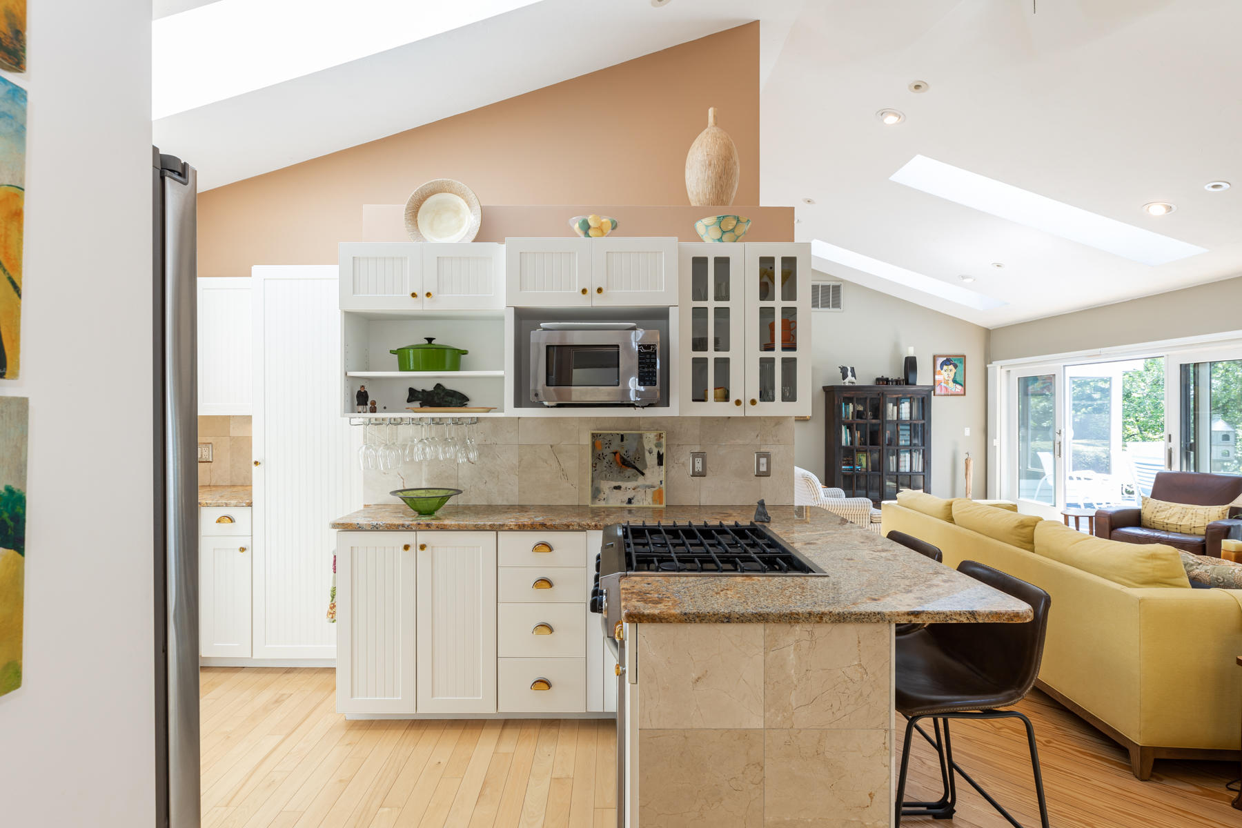 25 Adams Way Eastham, MA 02642 - Photo 48 of 60 a living room with stainless steel appliances kitchen island granite countertop a stove and a refrigerator