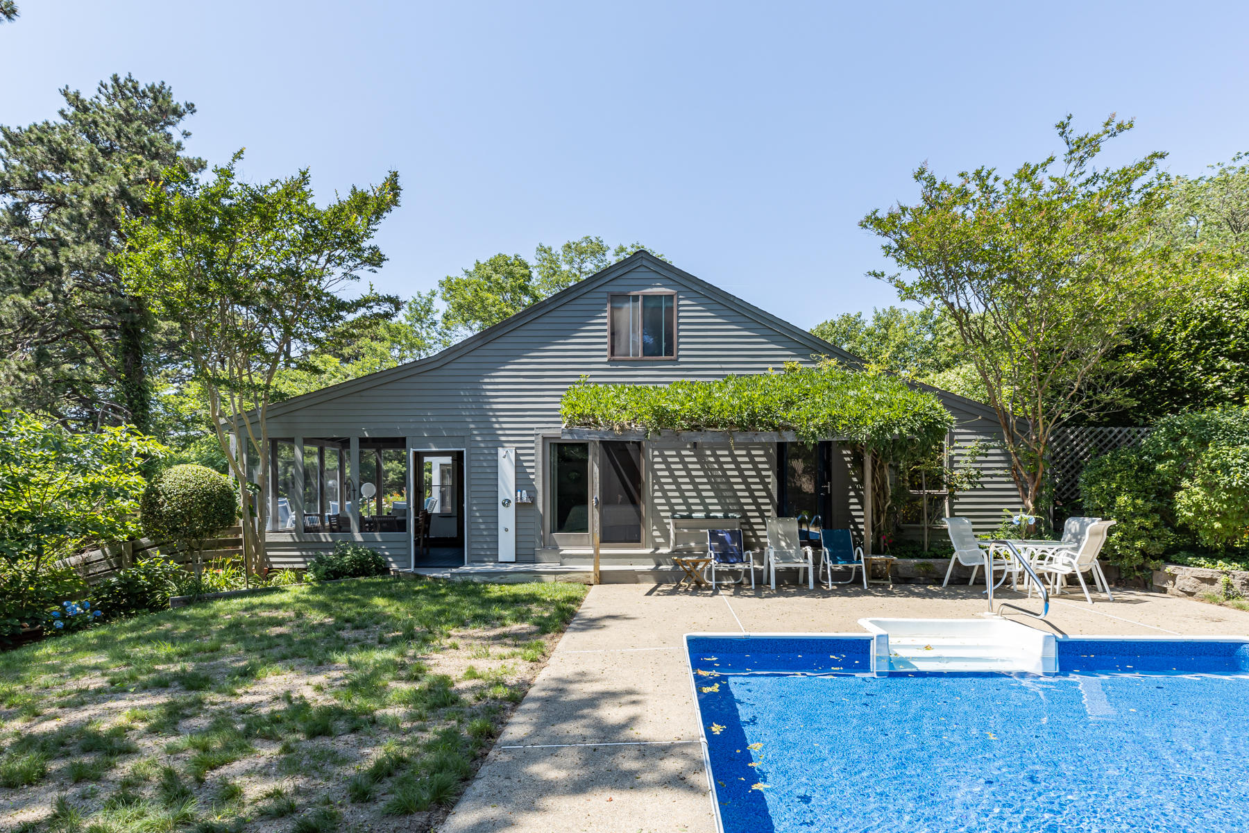25 Adams Way Eastham, MA 02642 - Photo 55 of 60 a view of a house with swimming pool and sitting area