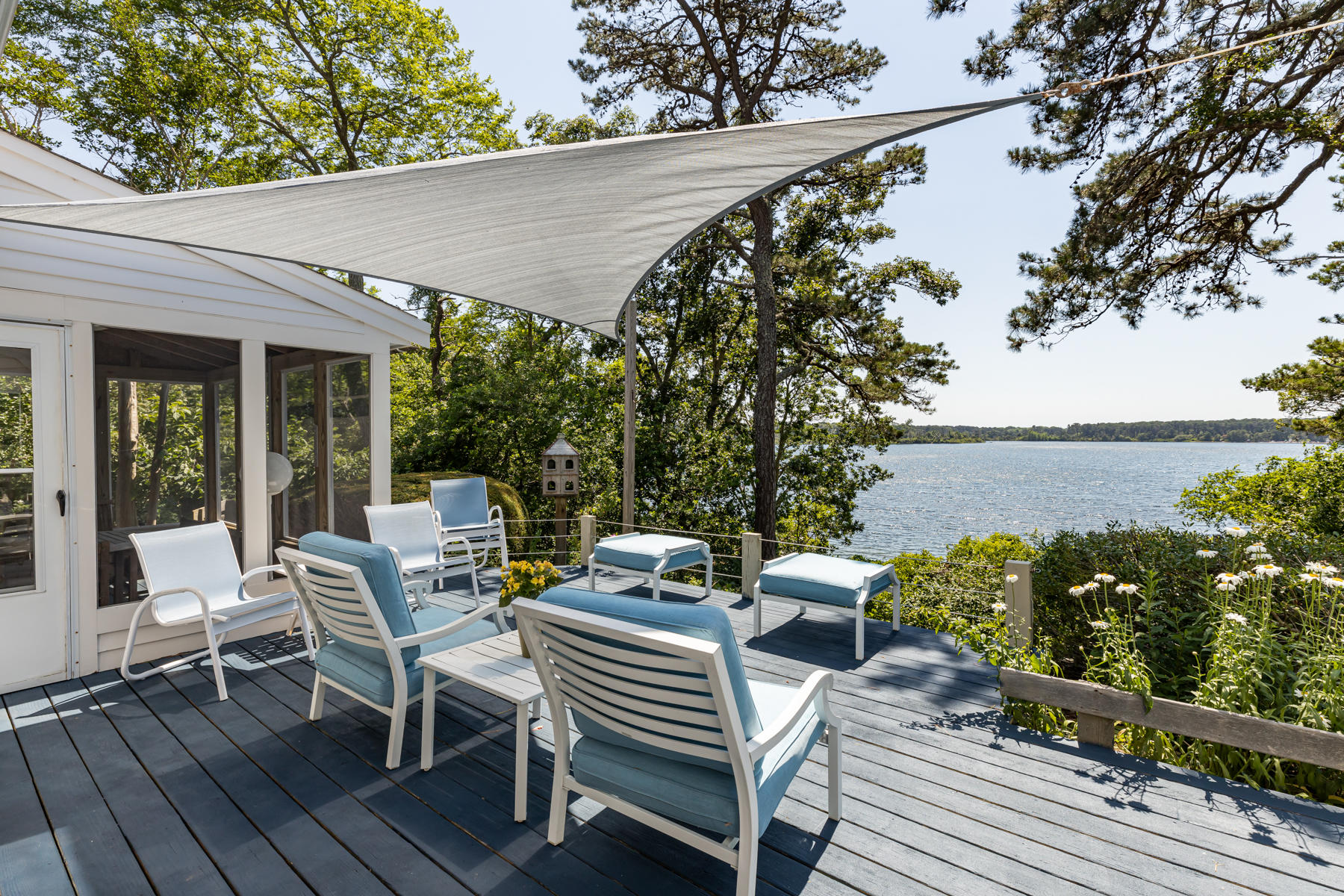 25 Adams Way Eastham, MA 02642 - Photo 57 of 60 a view of a patio with two chairs and a table