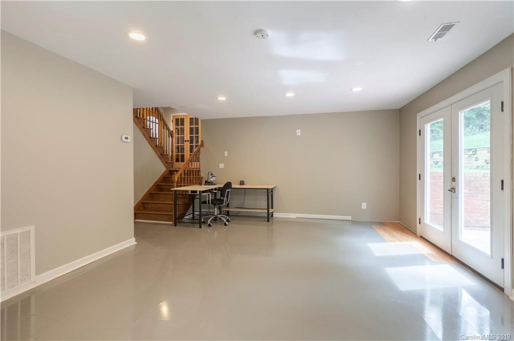 3515 Lake Shore Road South Denver, NC 28037 - Photo 22 of 46 an empty room with furniture and gym equipment