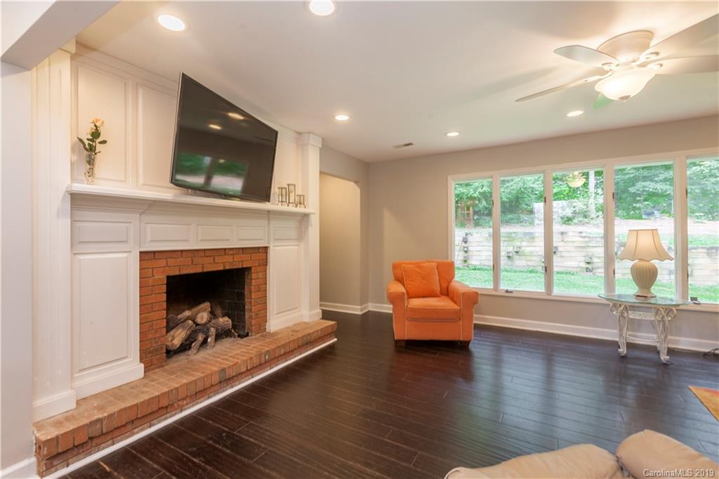 3515 Lake Shore Road South Denver, NC 28037 - Photo 4 of 46 a living room with furniture and a fireplace