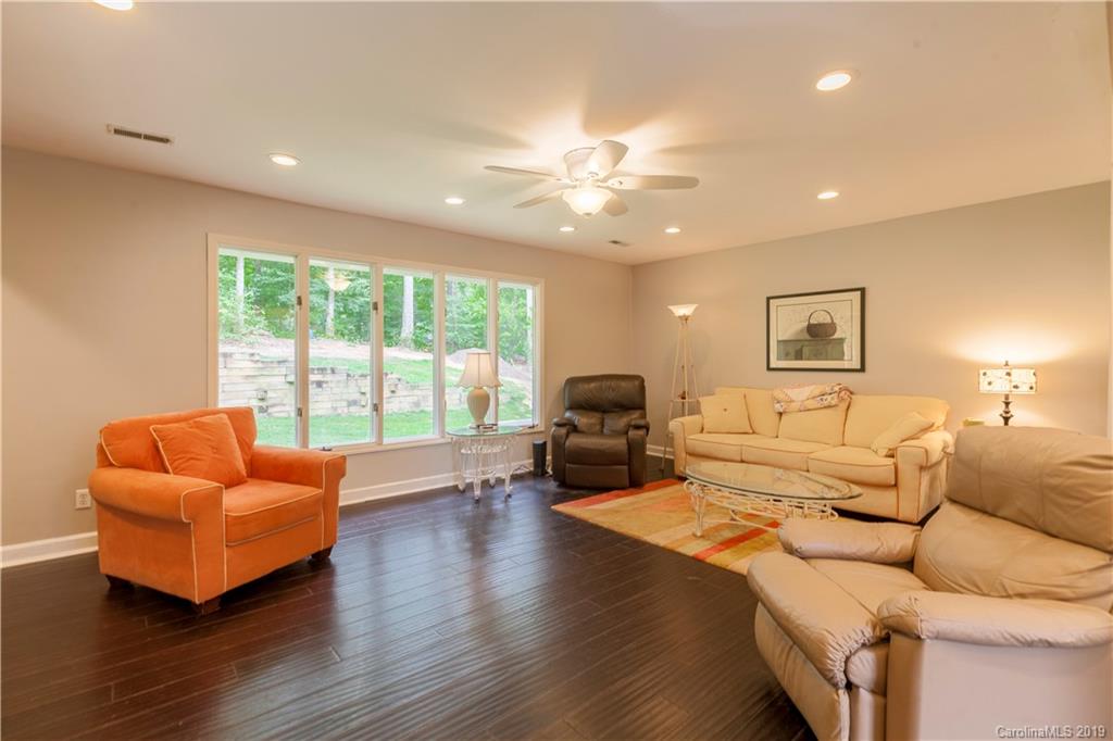 3515 Lake Shore Road South Denver, NC 28037 - Photo 5 of 46 a living room with furniture and wooden floor