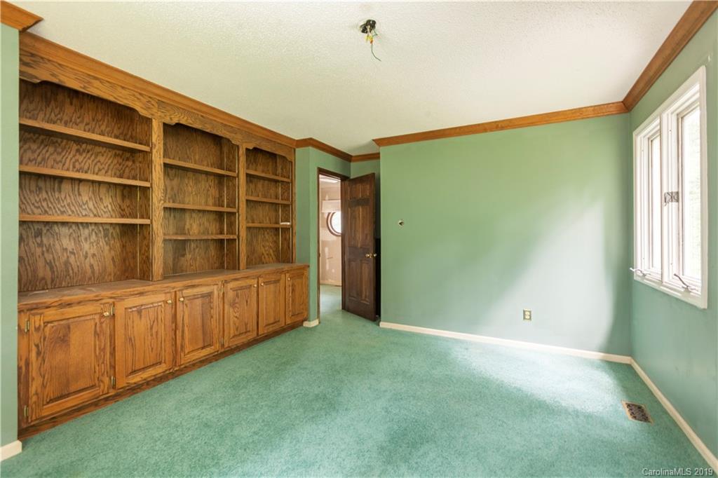 3515 Lake Shore Road South Denver, NC 28037 - Photo 41 of 46 a view of an empty room with cabinet and a window