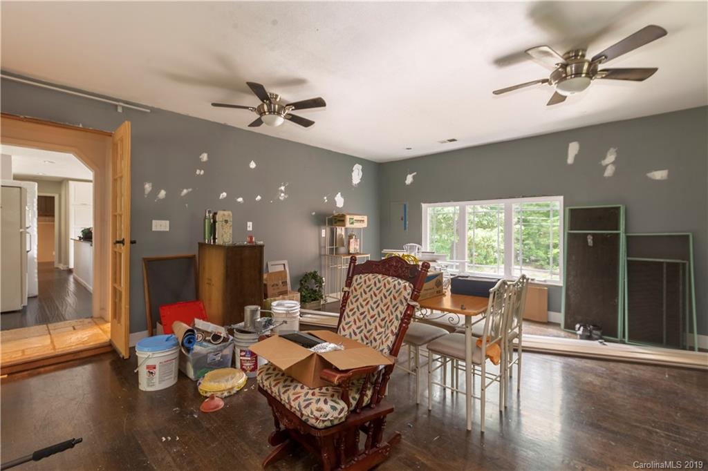 3515 Lake Shore Road South Denver, NC 28037 - Photo 42 of 46 a view of a dining room with furniture window and wooden floor