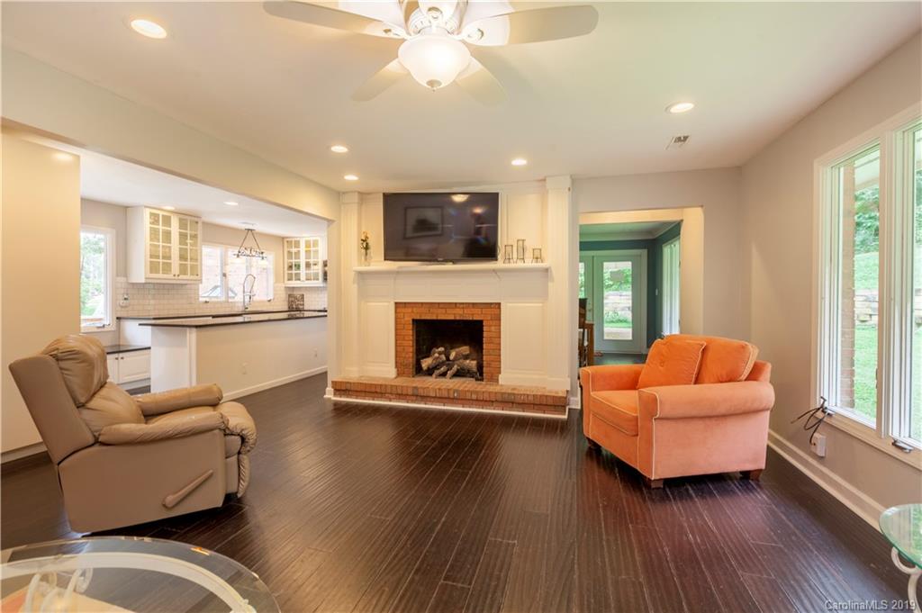 3515 Lake Shore Road South Denver, NC 28037 - Photo 8 of 46 a living room with furniture and a fireplace