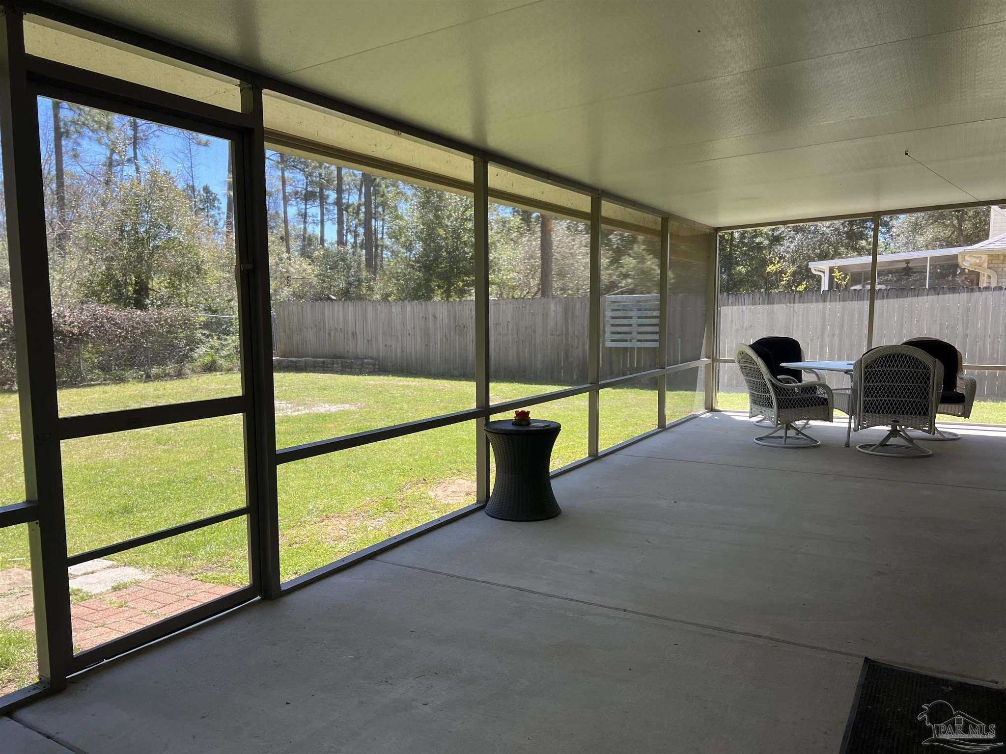 12465 Red Cloud Road Pensacola, FL 32507 - Photo 56 of 68 a view of a floor to ceiling window in an empty room